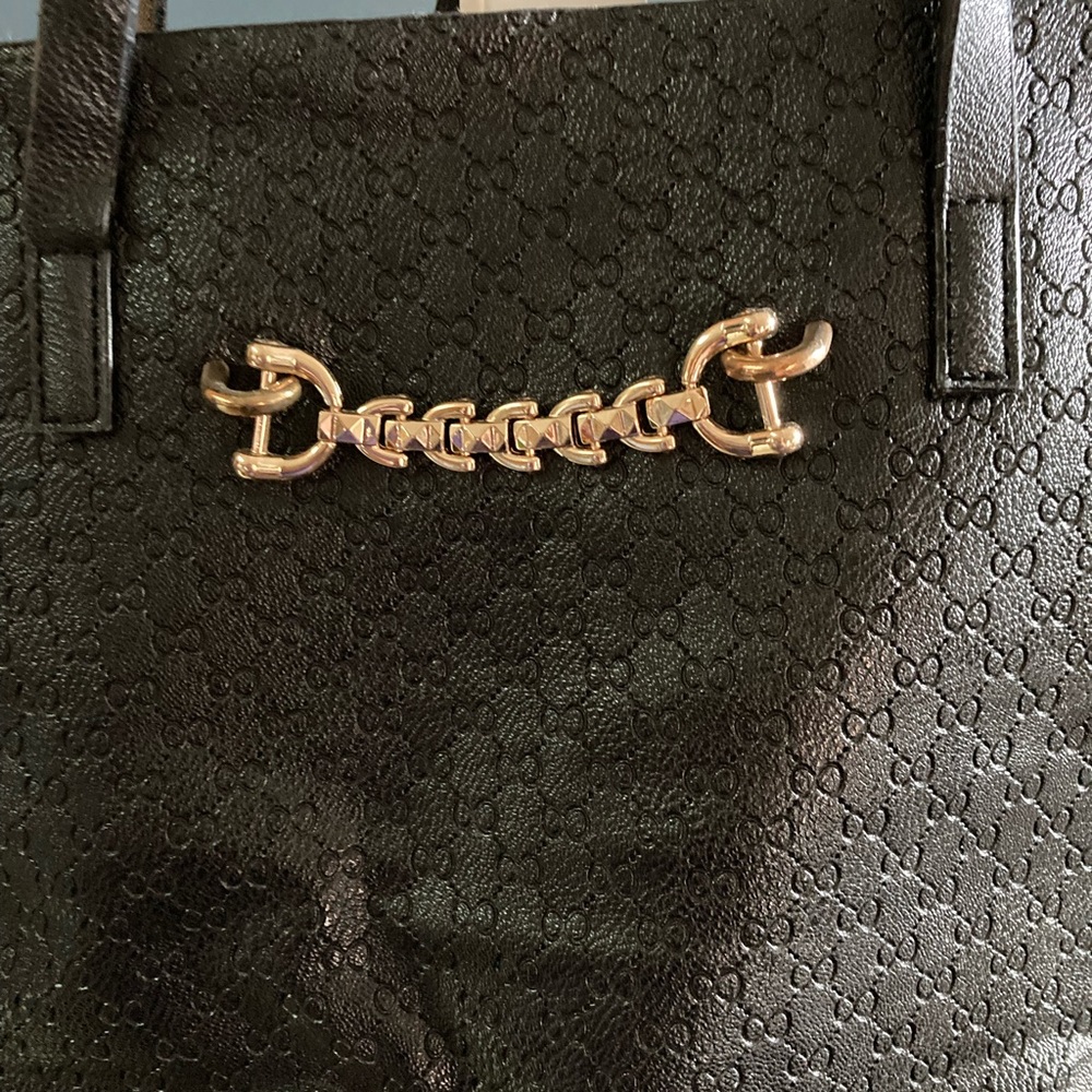Simi 2 in 1 tote and handbag. Black vegan leather. 1 large tote plus 1 zip bag